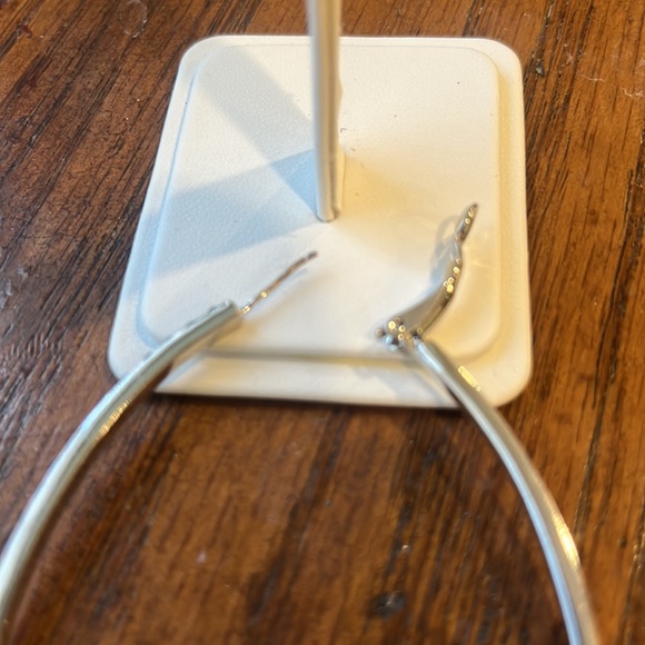 Large rhodium hoops with striking black Swarovski crystals. - Picture 6 of 7